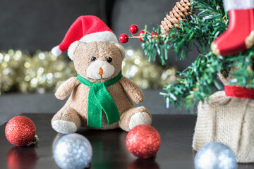 Christmas  teddy bear and New Year decorations on the table  