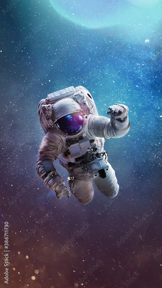 Aufkleber Astronaut in bright galaxy. Universe and spaceman. Astronaut in the outer space. Vertical wallpaper. Elements of this image furnished by NASA
