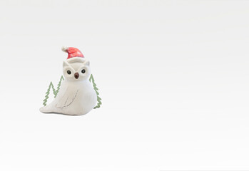 merry cristmas white owl with santa hat on a white background