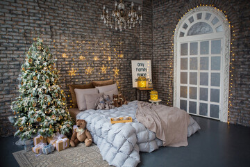 bed in the bedroom with Christmas and New Year decor