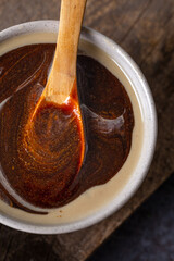 Tahini and Molasses / Turkish Tahin Pekmez in bowl. Top view.