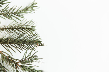 Fir pine branches frame. Christmas tree on the white background. Top view, flat lay