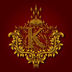 Letter K heraldic monogram in coats of arms form. Vintage golden logo with shadow on maroon background. Letter K is surrounded by floral elements of design.