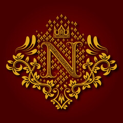 Letter N heraldic monogram in coats of arms form. Vintage golden logo with shadow on maroon background. Letter N is surrounded by floral elements of design.