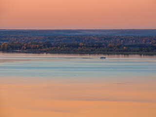 View of Volga river at sunset, Tatarstan, Russia.  Boat at the river.