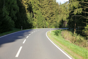 Road with hill and trees