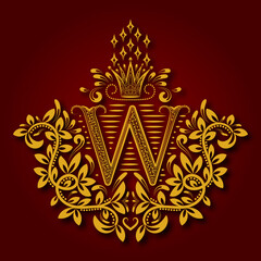 Fototapeta premium Letter W heraldic monogram in coats of arms form. Vintage golden logo with shadow on maroon background. Letter W is surrounded by floral elements of design.