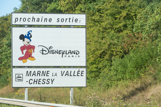 Lognes &ndash; France, August 19, 2019 : Disneyland roadsign on the highway