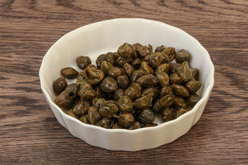 Tasty capers in the bowl