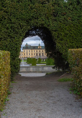 View trough a arc in a hedge in a park on the Drottningholm island