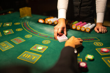 Casino Black Jack table with poker cards and chips.