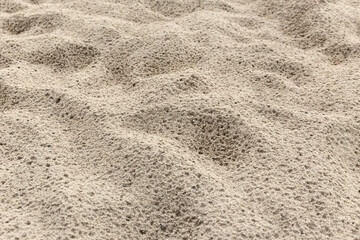 Fototapeta na wymiar Sand background texture after rain