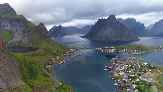 panoramic view of a beautiful town with a bay whis boats in the fjords