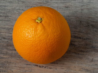 Fresh orange fruit on raw boards