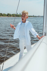 singing, blonde, blue, boat, boy, caucasian, crew, cruise, cute, education, fashion, fun, handsome, happy, leisure, lifestyle, male, marina, marine, nautical, navigator, outdoor, portrait, river, sail