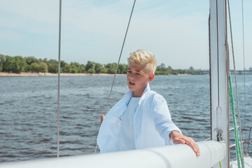 singing, blonde, blue, boat, boy, caucasian, crew, cruise, cute, education, fashion, fun, handsome, happy, leisure, lifestyle, male, marina, marine, nautical, navigator, outdoor, portrait, river, sail