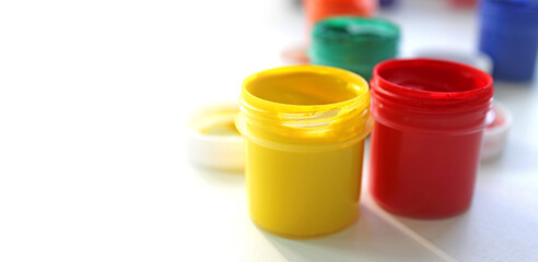 Children finger paint. Water based paints, isolated on a white background
