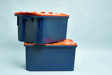Plastic storage boxes. Boxes for the delivery of products. Orderly storage.