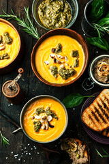 Pumpkin soup with cream with pesto and pate foie gras