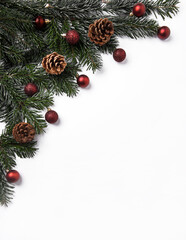 Festive Christmas background with red baubles and pine cones