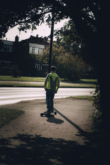 man walking in the rain