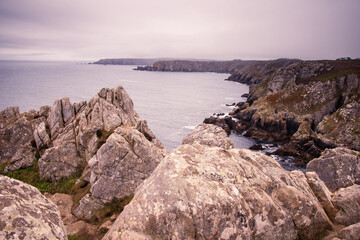 Fototapeta na wymiar ocean cliffs during cold and dark day, brittany, france