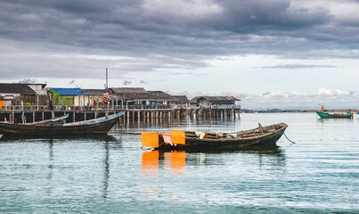 Fototapeta premium Fishery wooden boats with outdoor sun.