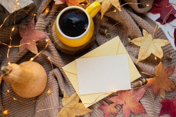 fall mockup card with autumn leaves invitation card with environment and details Mockup with postcard and flowers and ribbon on white background.
