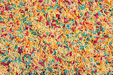 Close-up of colorful sweet noodles. Sugar whims.