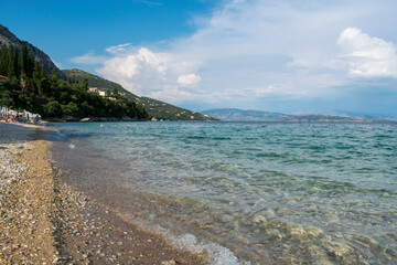 Obraz premium The pristine Barbati beach at the foothill of Mount Pantokrator on Corfu Island, Greece