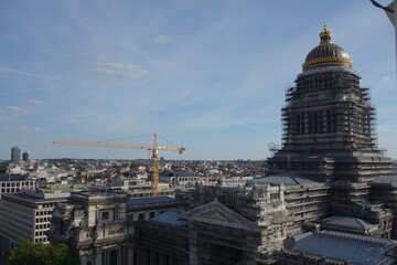 Fototapeta na wymiar Brussels, Belgium - August 4, 2020: Cityscape and Palais de Justice, national courthouse under restoration with scaffolding