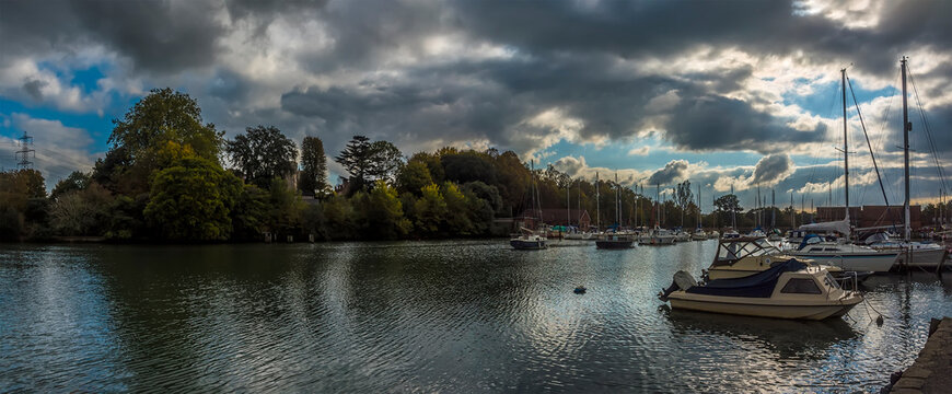 A panorama view across the River Test at Eling near Southampton, UK in Autumn
