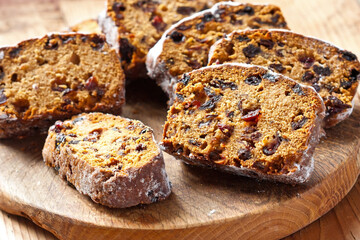 Christmas cake with spices and dried fruits, selective focus