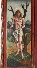 Fototapeta na wymiar San Sebastiano; anta di altare a portelle nel santuario di Santa Maria a Baselga di Bresimo (Trentino)