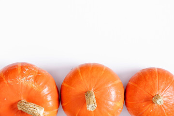 Autumn minimal composition. Pumpkin on white background. Halloween, thanksgiving day concept. Autumn, fall background. Flat lay, top view, copy space