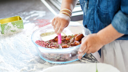 children's hands mix ingredients