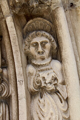 San Giovanni Battista; altorilievo nel portale della chiesa parrocchiale dei Santi Pietro e Paolo a Laces (Alto Adige)