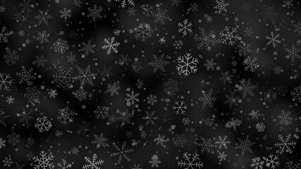 Christmas background of snowflakes of different shapes, sizes and transparency in gray and black colors