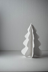
white christmas tree made of paper