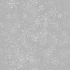 Fototapeta na wymiar Christmas seamless pattern of snowflakes of different shapes, sizes and transparency, on gray background