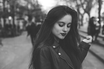 Young caucasian girl walking through Donostia-San Sebastian, basque Country.