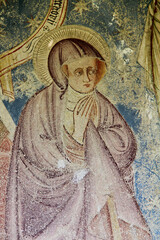 Obraz premium Maria sotto la Croce; particolare di affresco esterno della chiesa romanica di San Vigilio a Morter; Alto Adige