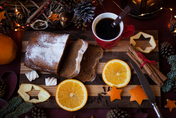 Christmas  and New Year preparations,serving table,hot coffee in the mug,christmas pie,fruits on the cutting board. holiday mood 