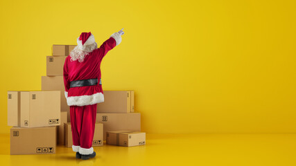Santa Claus in front of cardboard boxes that indicates something in the wall