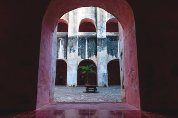 View through arch into patio in the former monestary Convent de San Bernardino de Siena in Valladolid, Yucatan, Mexico