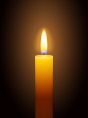 Realistic burning yellow candle on dark background