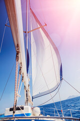 Sailing. Ship yachts with white sails in the open Sea.