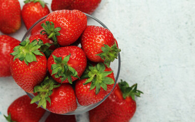 A bowl with ripe bright strawberry