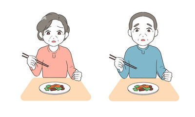 箸の持ち方を練習する　不安げ　高齢者