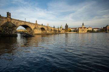 Fototapeta na wymiar panoramic view of Charles Bridge and the Vltava River. stone bridges on the river in the city. in the center of the old town of Prague in the Czech Republic
